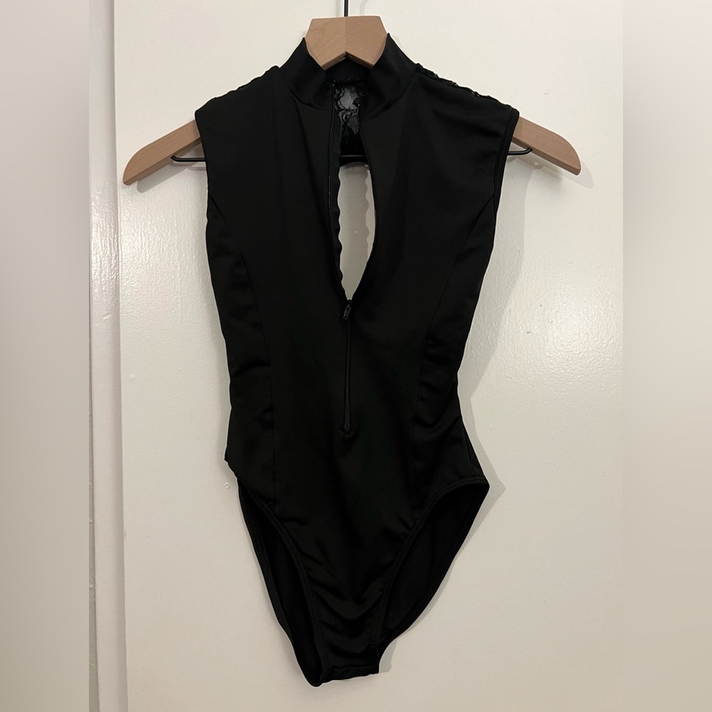 Elegant Black Sleeveless Ballet Leotard with a zipper and black lace